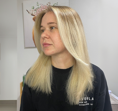 Straight blonde hair, side portrait at Salon Deelegance Caddens